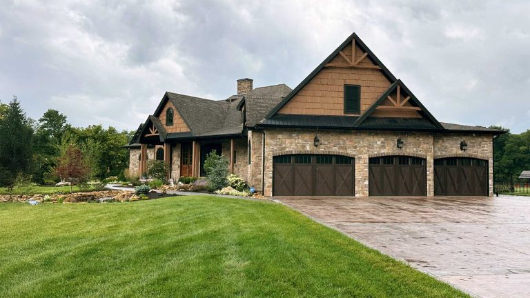 Example of residential garage door install project with Carriage house style panels